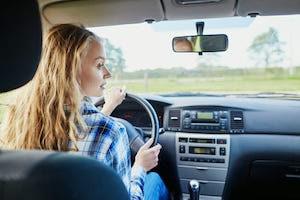 Woman Driving a Car